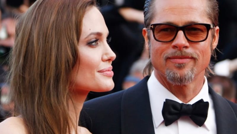 Angelina Jolie und Brad Bitt galten als Traumpaar in Hollywood. Nun führen sie schon einen für viele Jahre andauernden Rosenkrieg. (Bild: GUILLAUME HORCAJUELO / EPA / picturedesk.com)