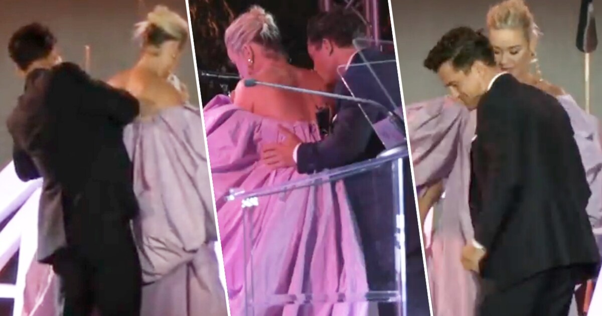 Dress mishap at Event – Orlando Bloom frees Katy Perry from her corset