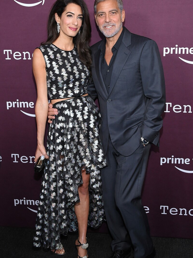 Amal und George Clooney bei der Premiere seines Films „The Tender Bar“ in Los Angeles (Bild: APA/Photo by LISA O‘CONNOR/AFP)