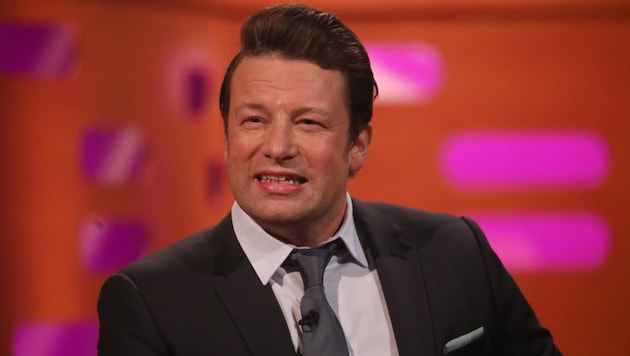 Jamie Oliver is best known as a TV chef. But he has also written children's books. One of them is now being criticized in Australia. (Bild: Isabel Infantes / PA / picturedesk.com)