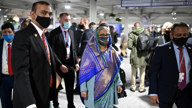 Der Andrang beim Klimagipfel ist groß, eine Delegation nach der anderen kommt aufs Gelände. (Bild: AFP)