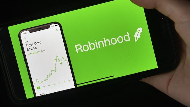 Der beliebte Online-Broker Robinhood schluckt die Kryptobörse Bitstamp. (Bild: AFP)