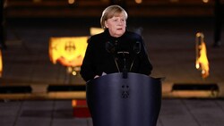 Merkel rief in ihrer Abschiedsrede zur Verteidigung der Demokratie gegen Hass, Gewalt und Falschinformationen auf. (Bild: AFP)