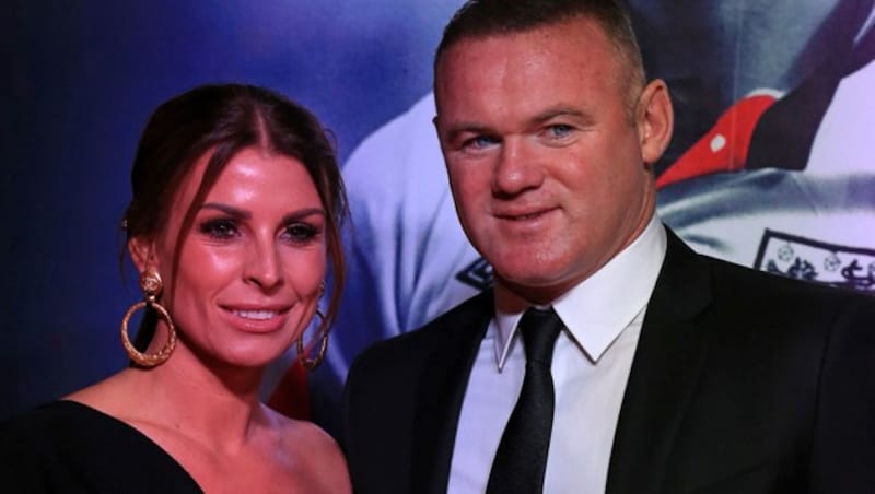 Wayne Rooney und seine Ehefrau Coleen (Bild: APA/AFP/Lindsey Parnaby)