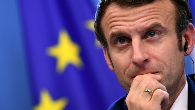 Macron hegt ein wenig Optimismus für das kommende Jahr. (Bild: AFP/JOHN THYS)