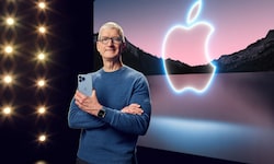 Apple-Boss Tim Cook mit seiner Cash-Cow, dem iPhone.