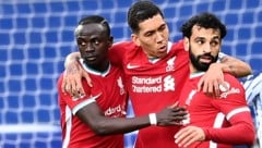 Roberto Firmino (Mitte) zusammen mit Sadio Mane (li.) und Mohamed Salah (Bild: APA/AFP/POOL/Laurence Griffiths)