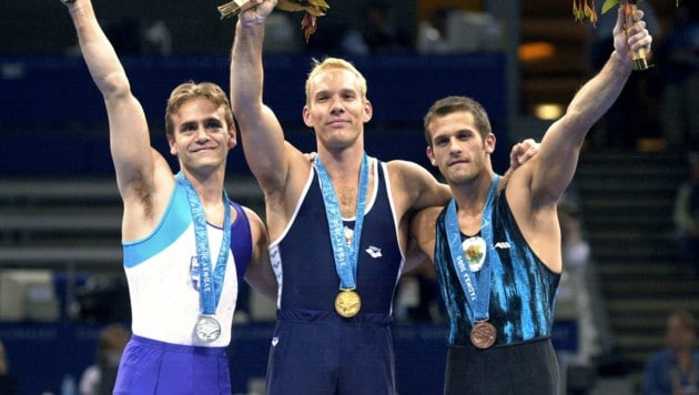 Szilvester Csollany (Bildmitte) bei seinem Olympiasieg 2000 (Bild: AFP)