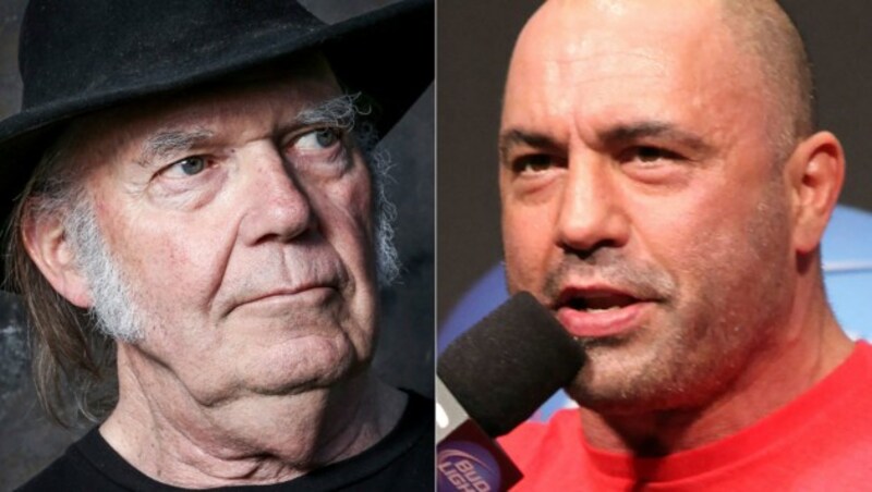 Aus Protest gegen den Podcaster Joe Rogan (re.) zieht sich Neil Young von Spotify zurück. (Bild: AP)