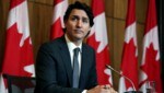 Premier Justin Trudeau setzt seine Arbeit aus der Quarantäne fort. (Bild: APA/AFP/Dave Chan)
