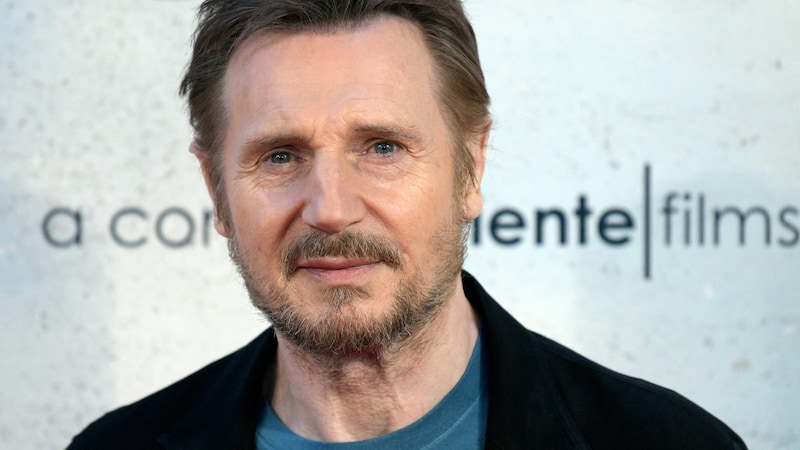 Liam Neeson can't stop gushing at the thought of Pamela Anderson. (Bild: AFP )