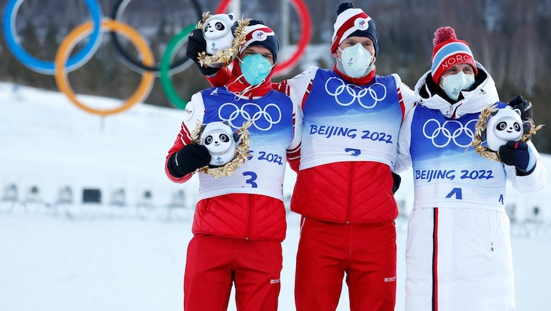 Jakimuschkin (li.), Bolshunov (mitte), Krüger (re.) (Bild: APA/AFP/Odd ANDERSEN)