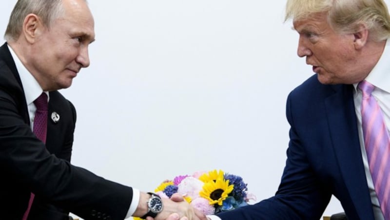 Trump und Putin 2019 beim G20-Gipfel in Osaka (Bild: APA/AFP/Brendan Smialowski)