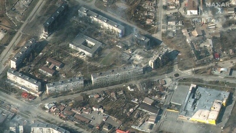 Satellitenbilder zeigen Zersörungen in der umkämpften Stadt Mariupol. (Bild: AFP)