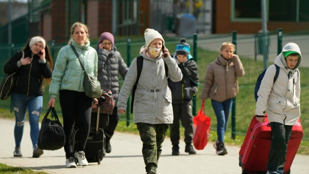 Flüchtlinge in Polen (Bild: AP)