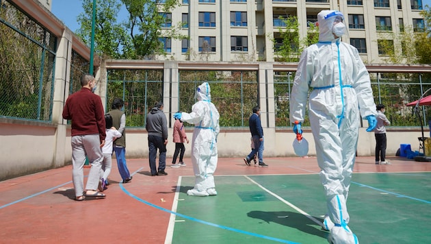 Massentest im Bezirk Pudong in Schanghai (Bild: APA/AFP/LIU JIN)