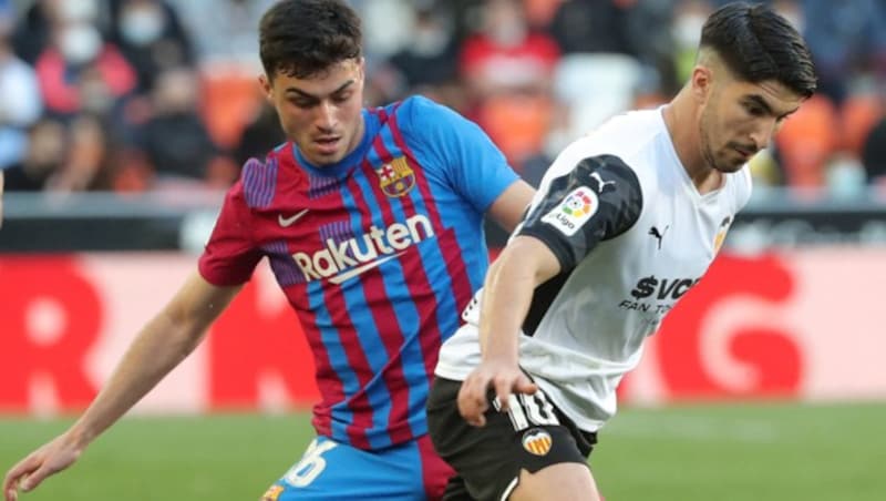 Carlos Soler (re.) (Bild: APA/AFP/JOSE JORDAN)