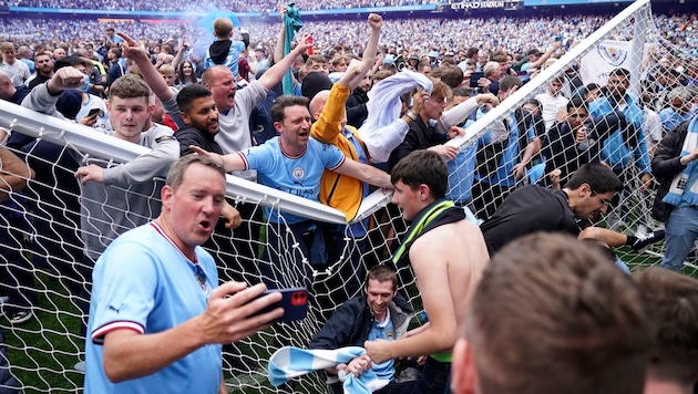 Manchester City Fans (Bild: Copyright 2022 The Associated Press. All rights reserved)