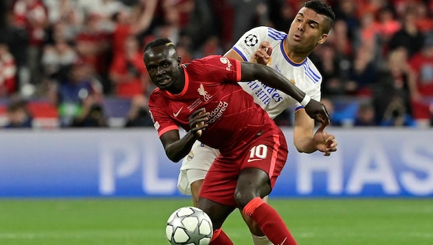 Sadio Mane, hier im Champions-League-Finale im Zweikampf mit Real Madrids Casemiro (Bild: APA/AFP/JAVIER SORIANO)