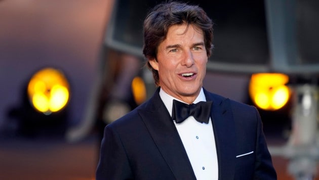 Tom Cruise bei der Premiere seines Films „Top Gun: Maverick“ (Bild: APA/AP Photo/Alberto Pezzali)