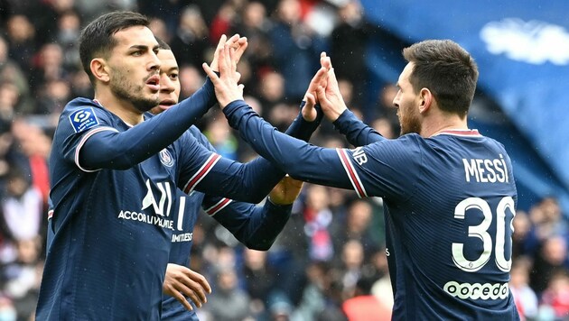 Leandro Paredes (l.), Lionel Messi (r.) (Bild: AFP or licensors)