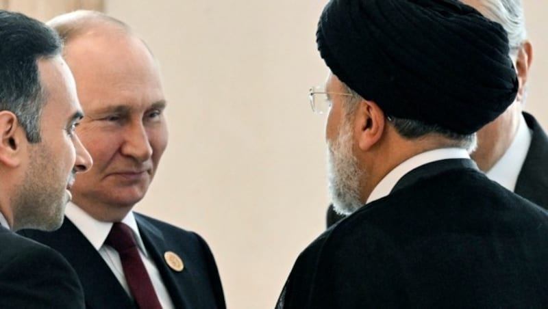 Putin mit Ebrahim Raisi am 29. Juni 2022 (Bild: Sputnik/AP/Grigory Sysoyev)