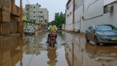 Überflutete Straße im Sudan (Bild: AFP)