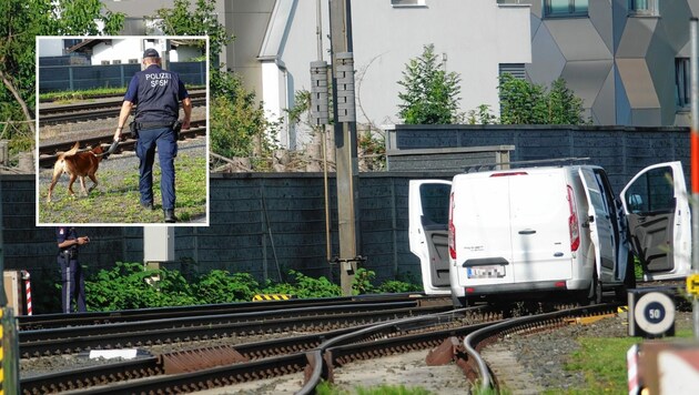 Das gestohlene Fluchtauto mit Linzer Kennzeichen. Ermittler von der Tiroler Polizei am Freitagvormittag bei der Spurensicherung. (Bild: zoom.tirol)