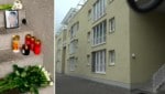 Flores y velas frente al edificio residencial en Bludenz (Imagen: Mathis Fotografie, Krone KREATIV)