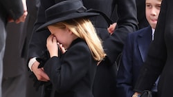 Prince George and Princess Charlotte attend the state funeral and burial of Britain‘s Queen Elizabeth, in London, Britain, September 19, 2022. (Photo by Phil Harris / POOL / AFP) (Bild: AFP)