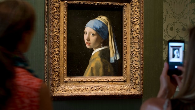 „Das Mädchen mit dem Perlenohrgehänge“ (um 1665) ist das wohl bekannteste Werk des niederländischen Künstlers Johannes Vermeer. (Bild: AP)