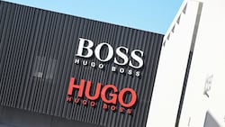 In Turbulenzen: Modekonzern Hugo Boss (Bild: APA/dpa/Bernd Weißbrod)