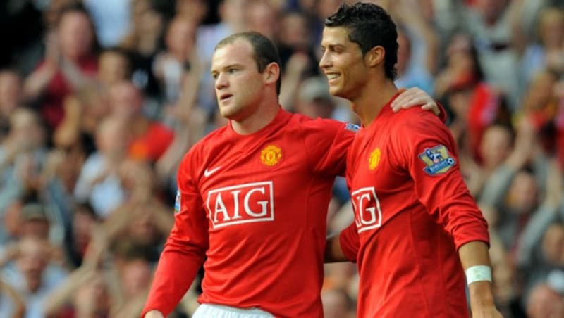 Wayne Rooney (l.) und Cristiano Ronaldo (r.) 2008 in ihrer gemeinsamen Zeit bei Manchester United (Bild: AFP)