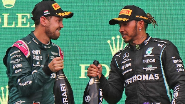 Sebastian Vettel und Lewis Hamilton (Bild: AFP)