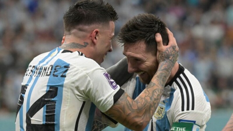 Lionel Messi und Enzo Fernandez (Bild: AFP or licensors)