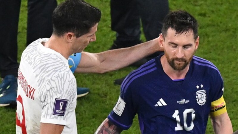 Robert Lewandowski und Lionel Messi (Bild: AFP or licensors)