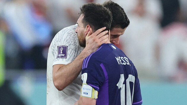 Robert Lewandowski (l.) und Lionel Messi (Bild: APA/AFP/Giuseppe CACACE)