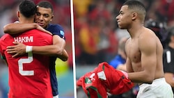 Kylian Mbappe tröstet Achraf Hakimi. (Bild: APA/AFP/FRANCK FIFE, AP)