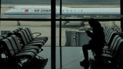 Urlauber sollen bald leichter nach China und Einheimische leichter ins Ausland kommen. (Bild: AP)