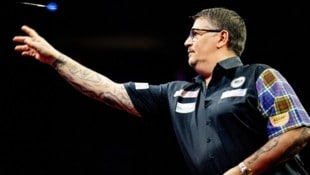 Gary Anderson ist bereits draußen. (Bild: AFP)