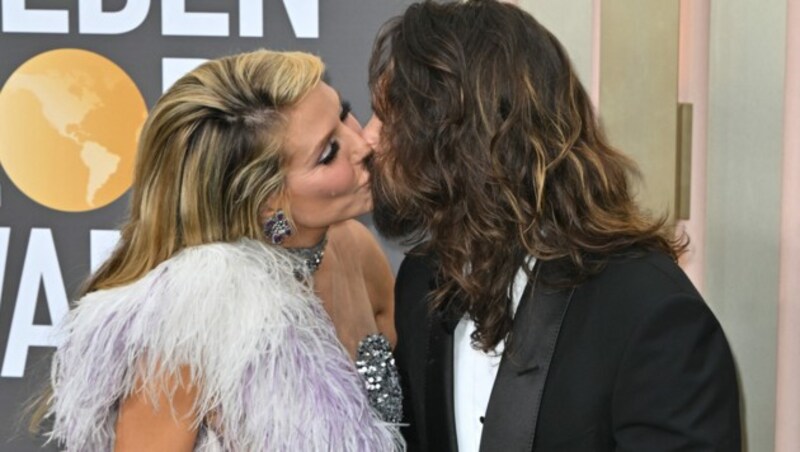 Ein Bussi für Tom: Heidi Klum kam mit ihrem Ehemann zu den Golden Globes. (Bild: APA/AFP/Frederic J. Brown)