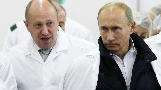 Der Chef der Wagner-Gruppe, Jewgeni Prigoschin, mit Wladimir Putin (Bild: AP)