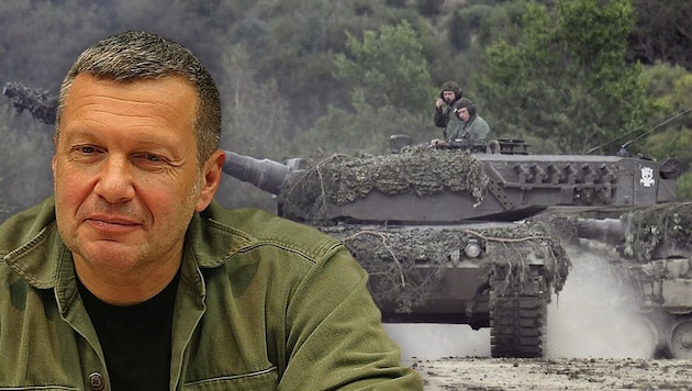 Der russische TV-Moderator Wladimir Solowjow gilt als Teil der russischen Propaganda. Im Hintergrund: ein Leopard-Kampfpanzer (Bild: Wikipedia P. Huber Krone KREATIV,)