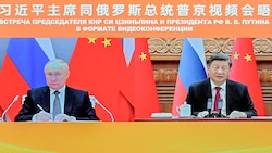 Die Präsidenten Wladimir Putin und Xi Jinping während einer Videokonferenz im Dezember 2022 (Bild: Associated Press)