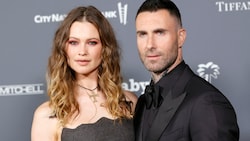 Behati Prinsloo und Adam Levine (Bild: APA/Getty Images via AFP/GETTY IMAGES/Amy Sussman)