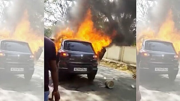 Drama in der indischen Stadt Kannur im Bundesstaat Kerala: Ein Auto ging in Flammen auf, eine Schwangere verbrannte hilflos. (Bild: Twitter.com)