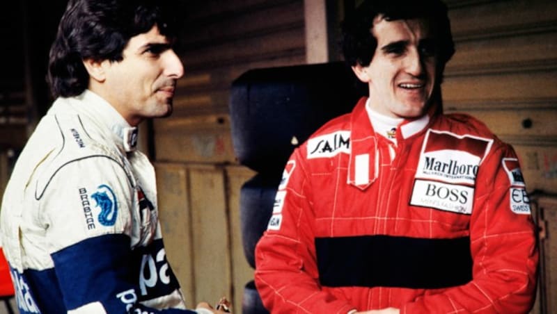 Nelson Piquet (links), hier als Brabham-Fahrer im Jahr 1983 mit McLaren-Pilot Alain Prost (Bild: APA/AFP/Gerard FOUET)