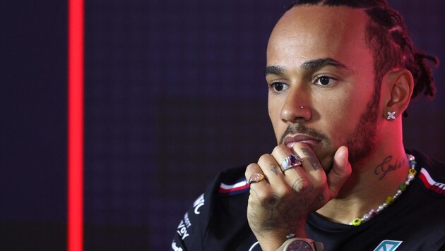 Lewis Hamilton hat all die Fragen zu Ferrari langsam satt. (Bild: APA/AFP/Giuseppe CACACE)