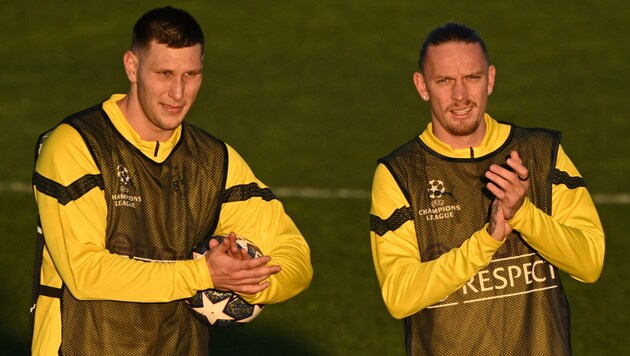 Niklas Süle (L) und Marius Wolf (Bild: AFP)