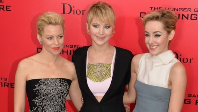 Elizabeth Banks, Jennifer Lawrence und Jena Malone (Bild: APA/AFP PHOTO/Stan HONDA STAN HONDA / AFP)